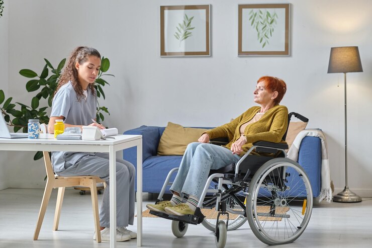 elderly-woman-talking-nurse-hospital_274679-31172
