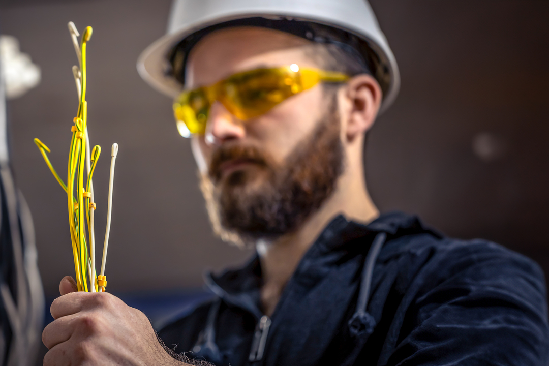 male-electrician-electrical-technician-working-switchboard-ezgif.com-resize